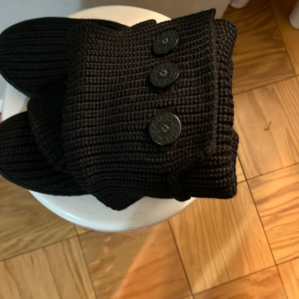 Black Ugg boots, made of Fabric.